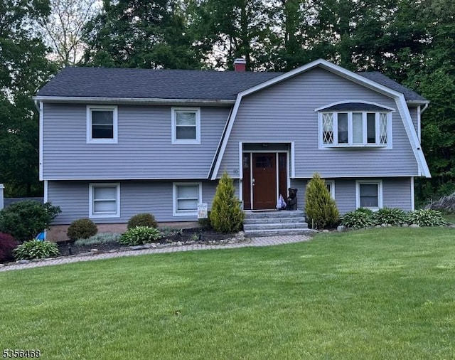 10 Lincoln Ave, Vernon Twp, NJ 07462 - bi-level home with a front lawn, entry steps, a chimney, and a gambrel roof