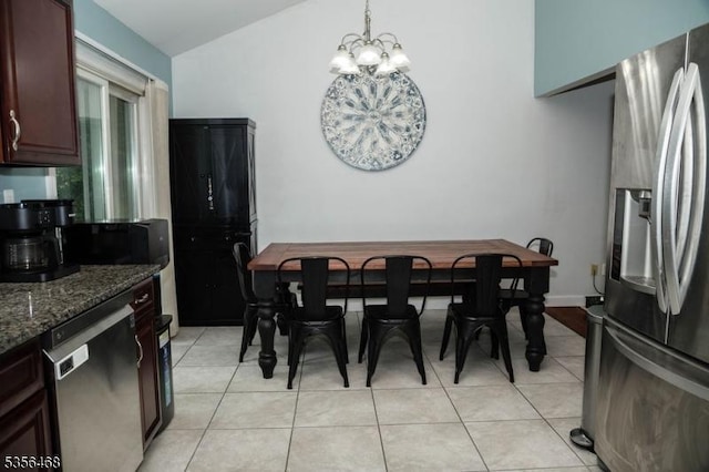 10 Lincoln Ave, Vernon Twp, NJ 07462 - kitchen featuring appliances with stainless steel finishes, a chandelier, light tile patterned floors, dark stone counters, and lofted ceiling