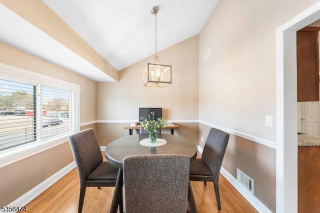 3522 Richmond Ct, Hillsborough Twp, NJ 08844 - dining room with light wood-type flooring, lofted ceiling, baseboards, and a chandelier
