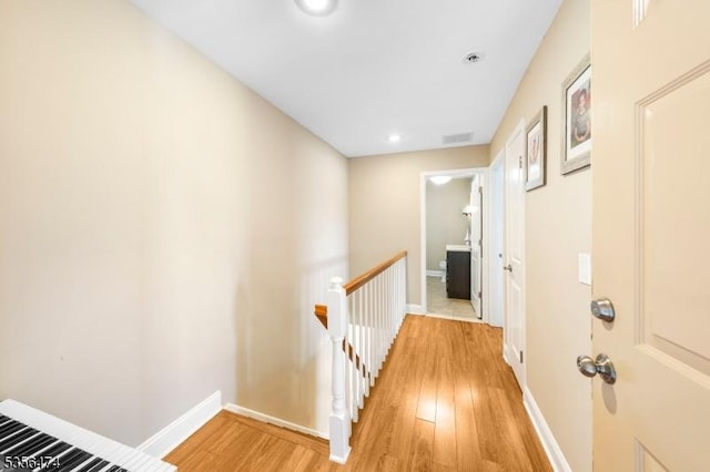 3522 Richmond Ct, Hillsborough Twp, NJ 08844 - hall with an upstairs landing, light wood-style flooring, recessed lighting, and baseboards