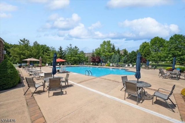 2 Fehervari Ct, Franklin Twp, NJ 08873 - community pool featuring a patio area