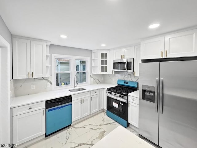 kitchen with stainless steel appliances, open shelves, a sink, light marble finish flooring, and white cabinets