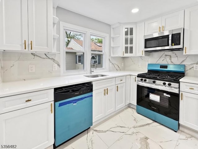 kitchen featuring appliances with stainless steel finishes, open shelves, a sink, white cabinets, and recessed lighting