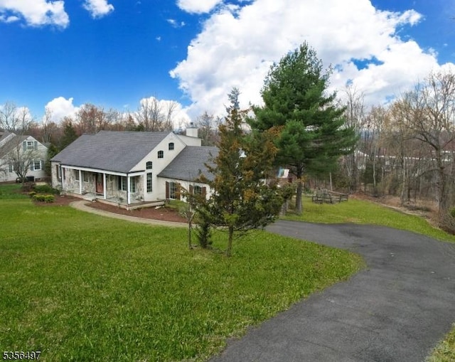 1111 Sky Hill Rd, Bridgewater Twp, NJ 08807 - view of front facade featuring a front yard and driveway