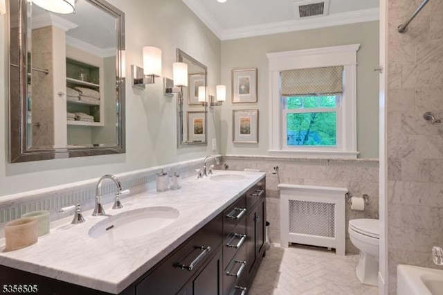 34 Crane Rd, Mountain Lakes Boro, NJ 07046 - bathroom with tile walls, radiator, crown molding, double vanity, and toilet