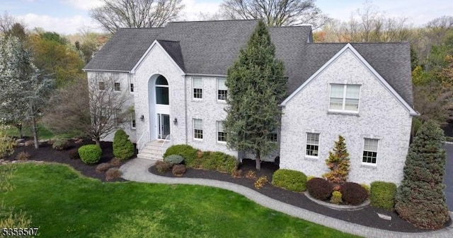 1 Dewing Ct, Raritan Twp, NJ 08551 - view of front of property with a front lawn and a shingled roof