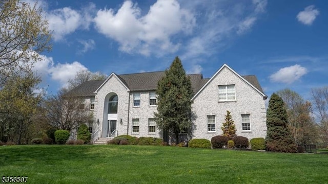 1 Dewing Ct, Raritan Twp, NJ 08551 - view of front facade with a front lawn and stone siding