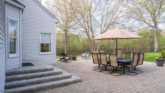 1 Dewing Ct, Raritan Twp, NJ 08551 - view of patio / terrace with an outdoor fire pit, fence, and outdoor dining space