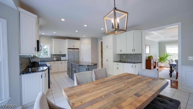 1 Dewing Ct, Raritan Twp, NJ 08551 - dining room featuring light tile patterned flooring, a chandelier, and recessed lighting