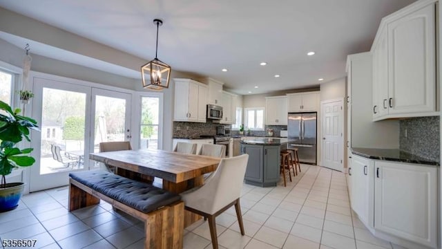 1 Dewing Ct, Raritan Twp, NJ 08551 - dining room featuring light tile patterned floors, a chandelier, and recessed lighting