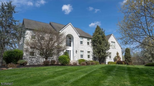 1 Dewing Ct, Raritan Twp, NJ 08551 - view of front of house featuring a front lawn and stone siding