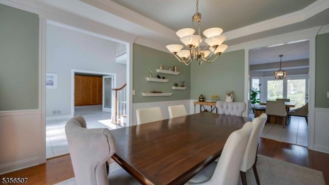 1 Dewing Ct, Raritan Twp, NJ 08551 - dining space featuring a chandelier, wood finished floors, and a tray ceiling