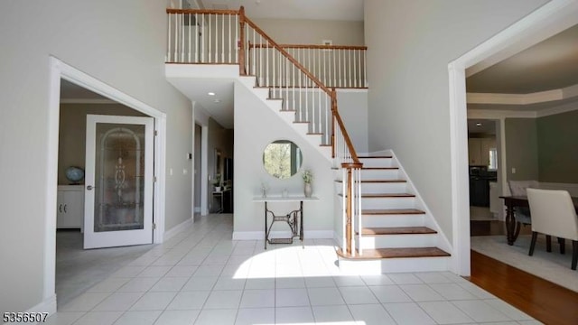 1 Dewing Ct, Raritan Twp, NJ 08551 - tiled foyer featuring stairs, crown molding, and baseboards