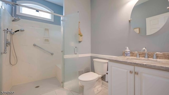 1 Dewing Ct, Raritan Twp, NJ 08551 - full bathroom with a shower stall, toilet, vanity, and tile patterned flooring