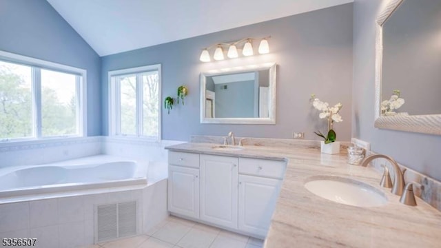 1 Dewing Ct, Raritan Twp, NJ 08551 - bathroom featuring lofted ceiling, a bath, double vanity, and tile patterned floors