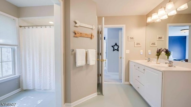 1 Dewing Ct, Raritan Twp, NJ 08551 - full bath featuring double vanity, baseboards, and a shower with shower curtain