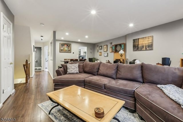 living room with recessed lighting and wood finished floors