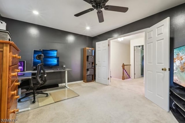 carpeted office space with a ceiling fan and recessed lighting
