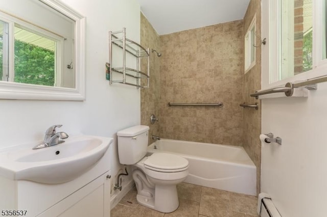 bathroom with baseboard heating, toilet, tile patterned flooring, vanity, and washtub / shower combination