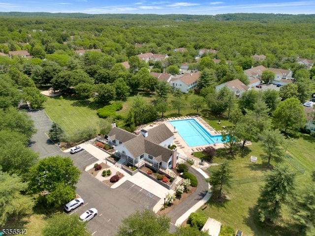 66 Jamestown Rd, Bernards Twp, NJ 07920 - drone / aerial view of a heavily wooded area and a pool area