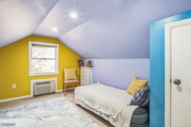 129 River Dr, Parsippany-Troy Hills Twp, NJ 07034 - carpeted bedroom with an AC wall unit, lofted ceiling, and baseboards