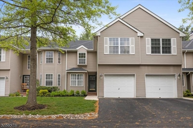 5 Roxiticus Ct, Clinton Twp, NJ 08801 - view of front of house with asphalt driveway, a garage, and a front lawn
