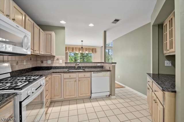 5 Roxiticus Ct, Clinton Twp, NJ 08801 - kitchen with white appliances, a sink, light brown cabinets, decorative backsplash, and a peninsula