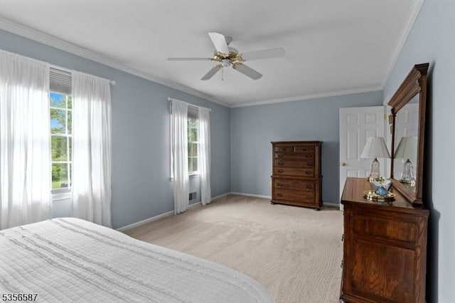 bedroom featuring multiple windows, crown molding, baseboards, light carpet, and ceiling fan