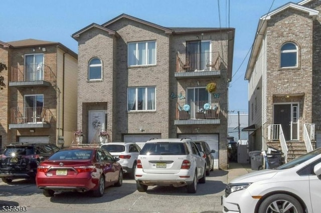 127 Brill St, Newark City, NJ 07105 - multi unit property featuring brick siding and a garage
