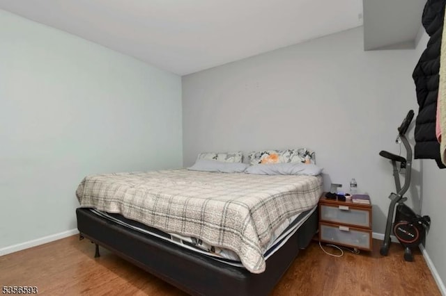 127 Brill St, Newark City, NJ 07105 - bedroom featuring baseboards and wood finished floors