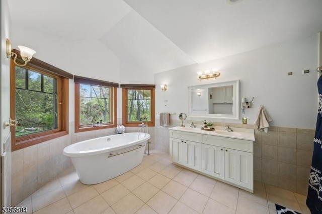 44 Mount Pleasant Rd, Knowlton Twp, NJ 07832 - full bathroom featuring tile walls, tile patterned floors, plenty of natural light, a soaking tub, and lofted ceiling
