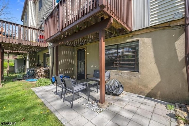 view of patio with a wooden deck