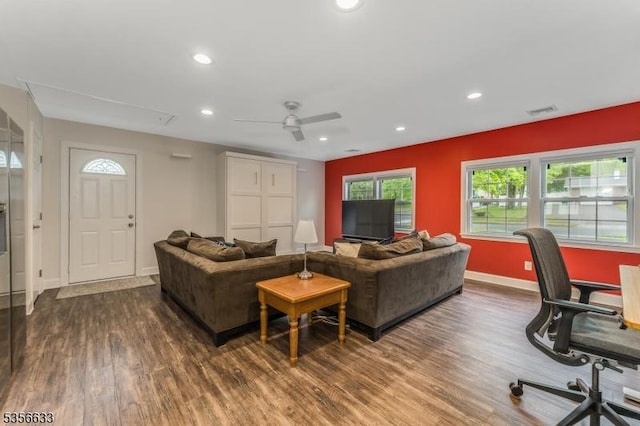living room featuring wood finished floors, recessed lighting, baseboards, and ceiling fan