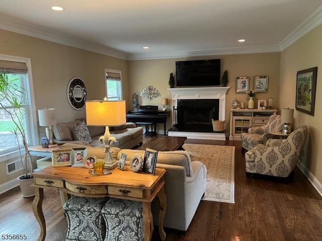77 Oak Rd, Boonton Twp, NJ 07005 - living room featuring baseboards, dark wood-style floors, a fireplace with raised hearth, crown molding, and recessed lighting