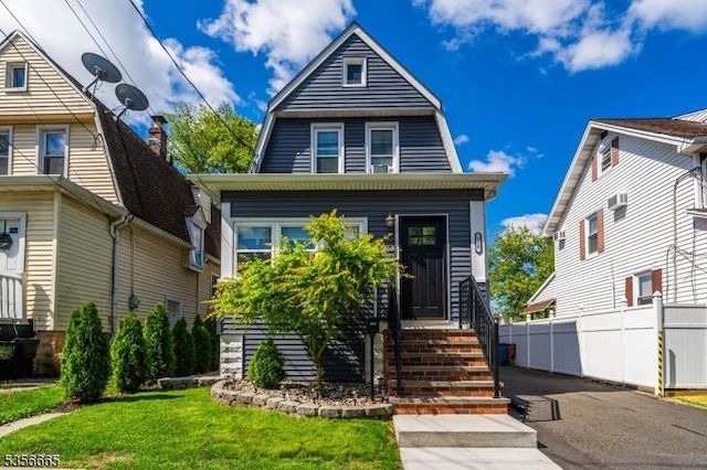 colonial inspired home with a gambrel roof