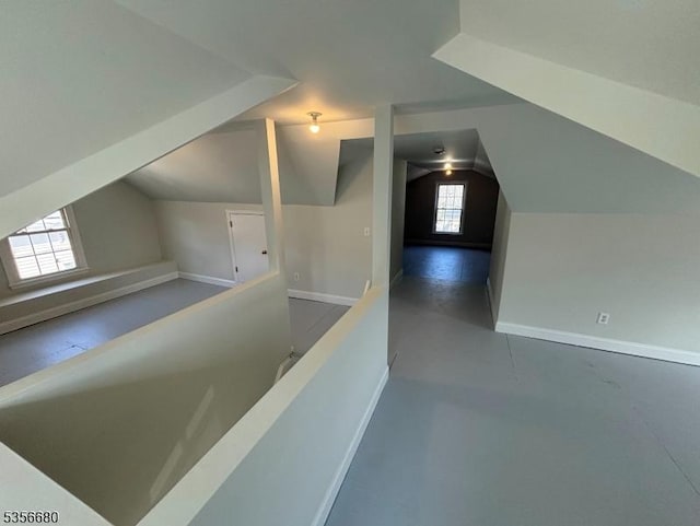 758 Somerset St Unit 2, Watchung Boro, NJ 07069 - bonus room featuring lofted ceiling, baseboards, and concrete floors