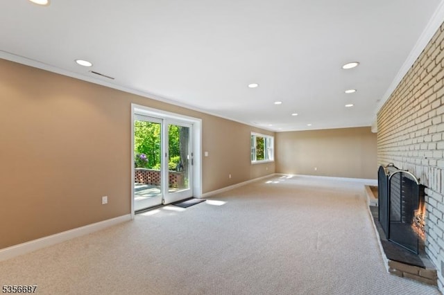 66 Skyline Dr, Morris Twp, NJ 07960 - unfurnished living room with crown molding, a brick fireplace, baseboards, carpet floors, and recessed lighting