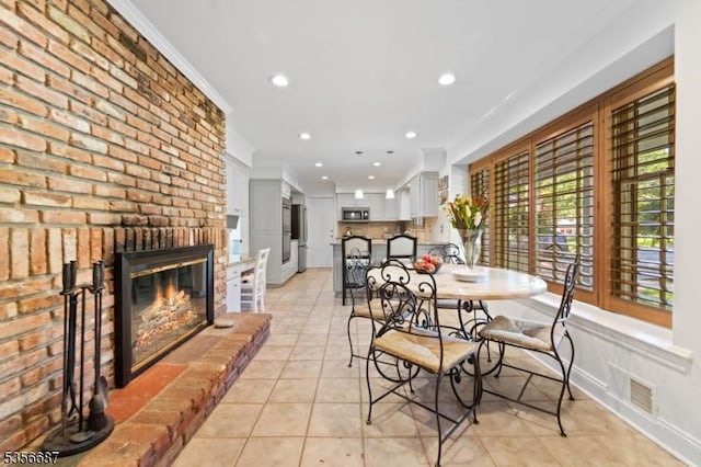 66 Skyline Dr, Morris Twp, NJ 07960 - dining room with light tile patterned floors, recessed lighting, a fireplace, and ornamental molding