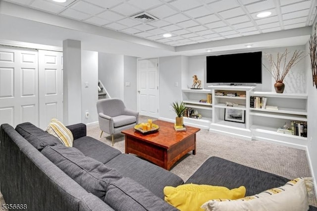 living room with carpet, stairs, baseboards, and recessed lighting