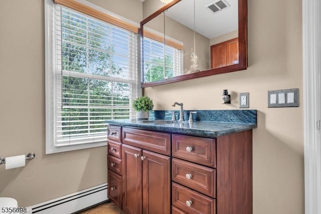 23 Andover Dr, Branchburg Twp, NJ 08853 - bathroom featuring baseboard heating and vanity