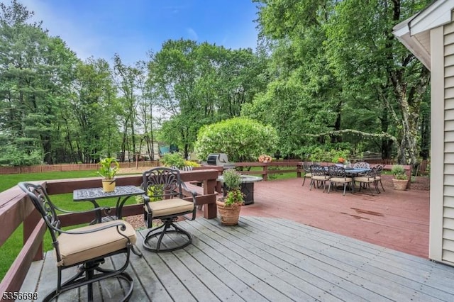 23 Andover Dr, Branchburg Twp, NJ 08853 - wooden terrace with outdoor dining area