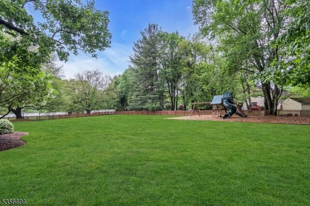 23 Andover Dr, Branchburg Twp, NJ 08853 - view of yard with a playground
