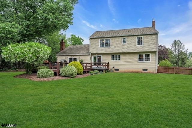 23 Andover Dr, Branchburg Twp, NJ 08853 - rear view of house featuring a chimney and a wooden deck