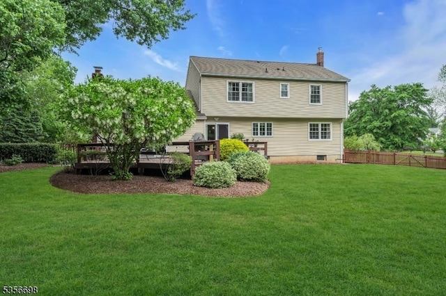 23 Andover Dr, Branchburg Twp, NJ 08853 - back of property featuring a deck and a chimney