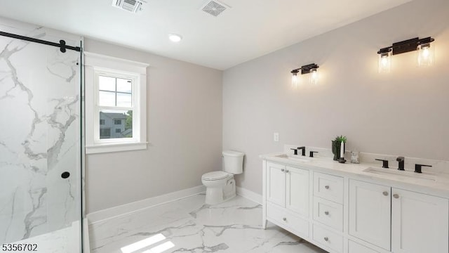 full bathroom featuring marble finish flooring, a marble finish shower, toilet, baseboards, and double vanity