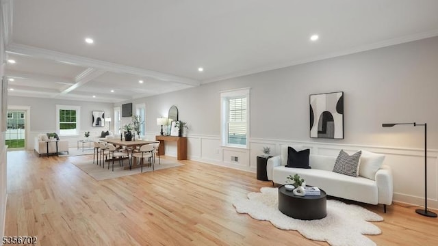 living area with beamed ceiling, light wood-style flooring, a wainscoted wall, a decorative wall, and recessed lighting