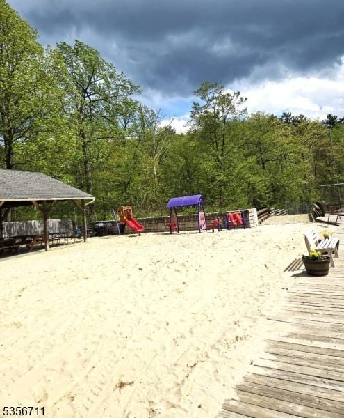 view of community with a wooded view