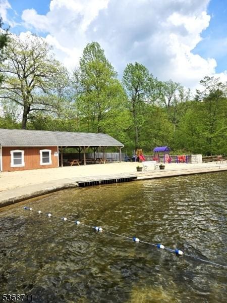 dock area featuring a water view