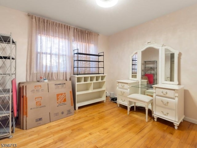 bedroom featuring light wood finished floors
