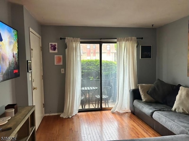 703 Nottingham Way, Raritan Twp, NJ 08822 - living room featuring hardwood / wood-style floors and baseboards